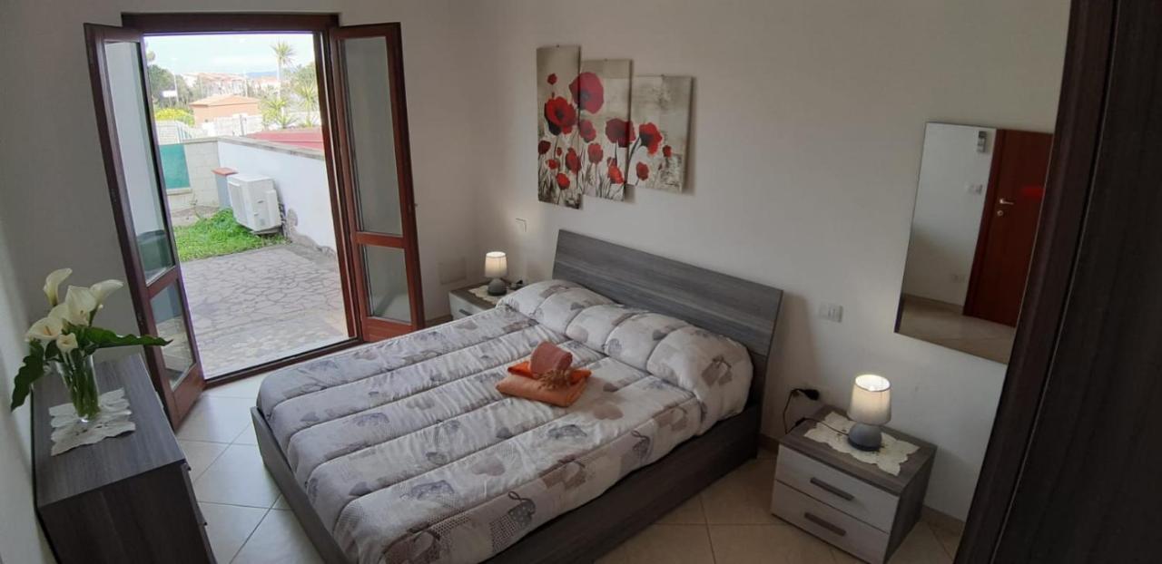 Rosa Сasa de vacaciones SantʼAntìoco